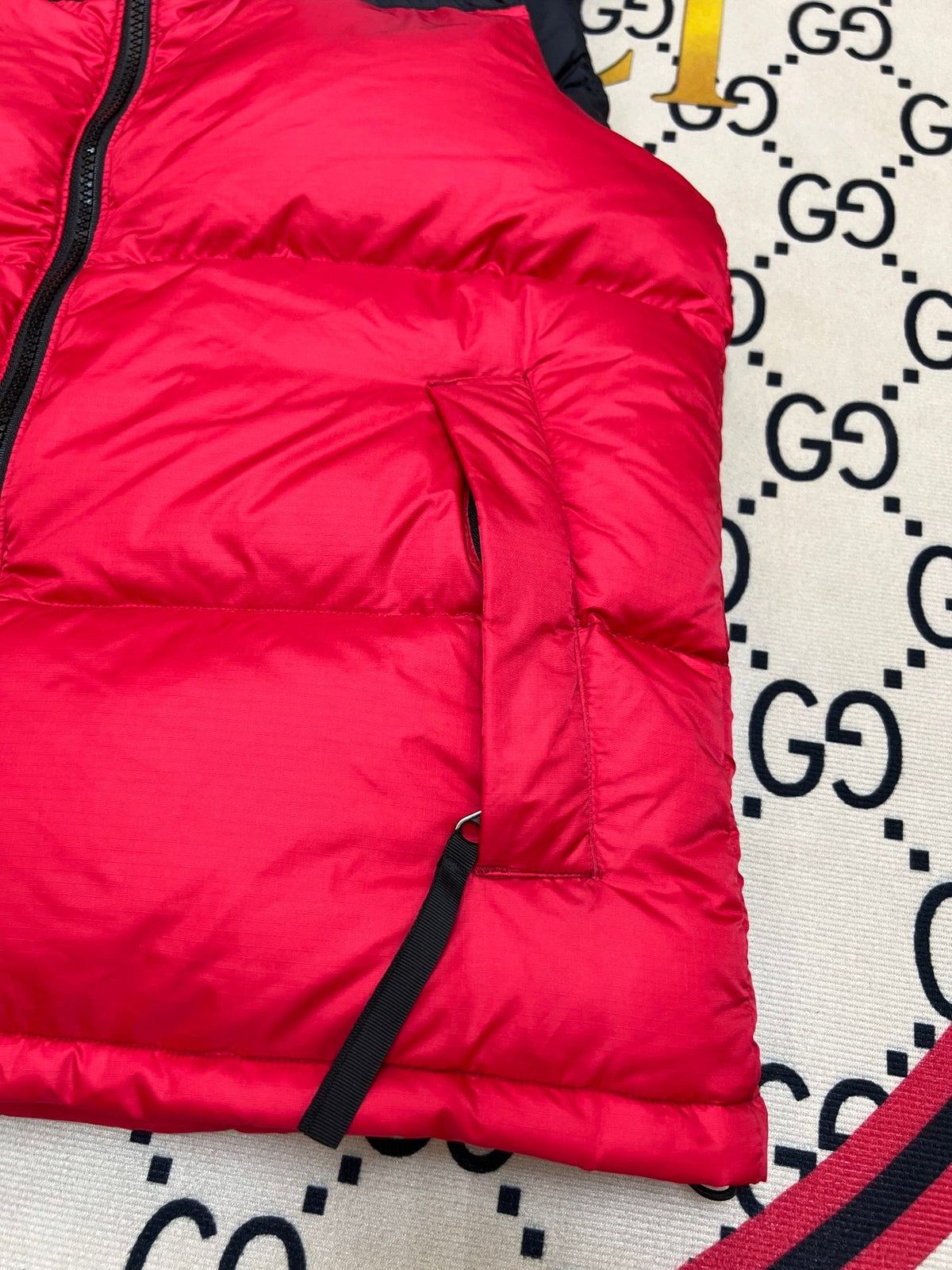 The North Face Puffer Vest in Red and Black with Stand Collar