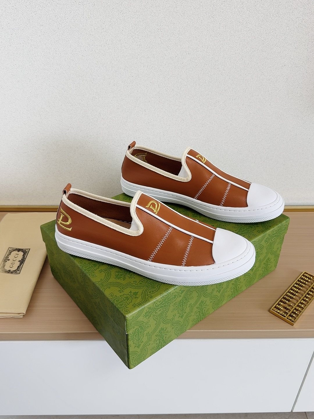 Gucci Brown Slip-On Sneakers with White Toe Caps