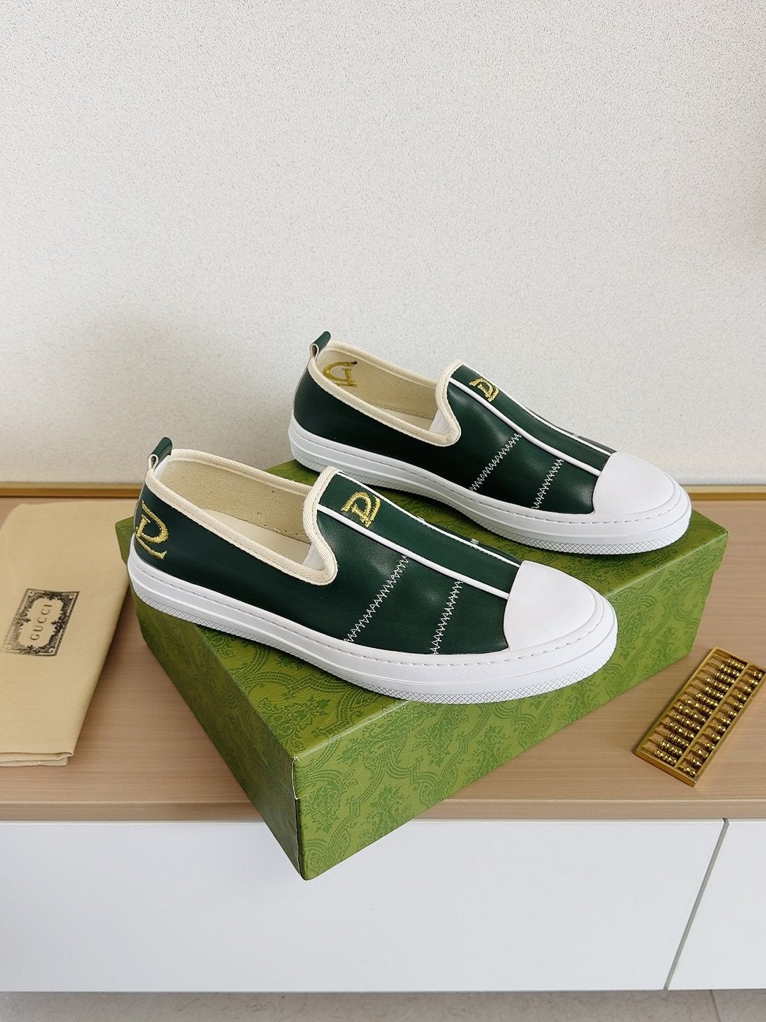 Gucci Brown Slip-On Sneakers with White Toe Caps